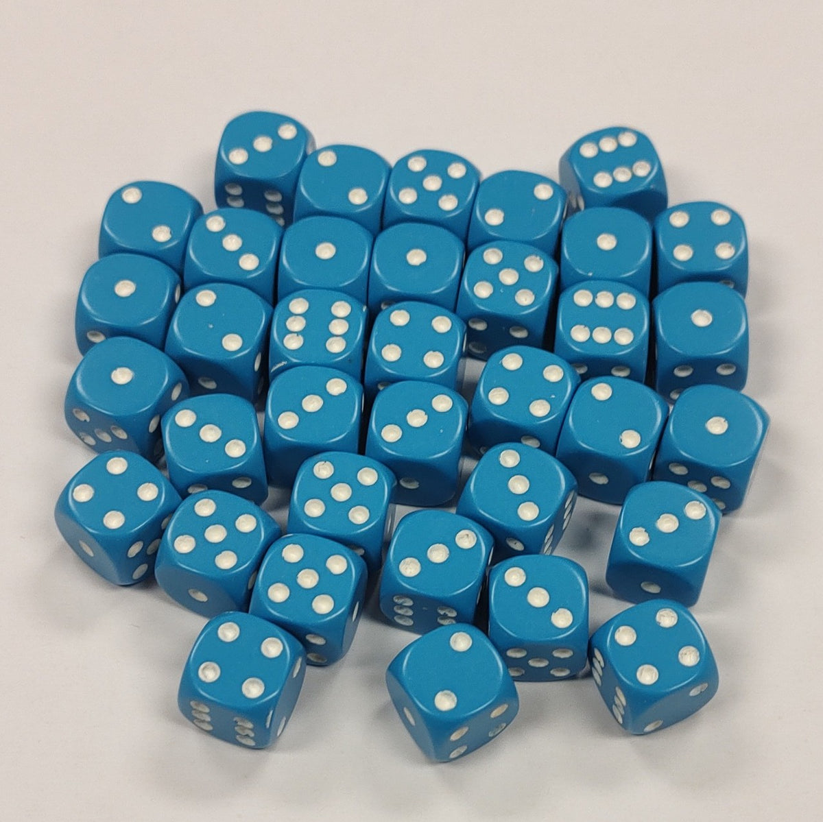 Opaque 12mm Dice w/ Rounded Corners Light Blue w/ White Pips (36 Pk)